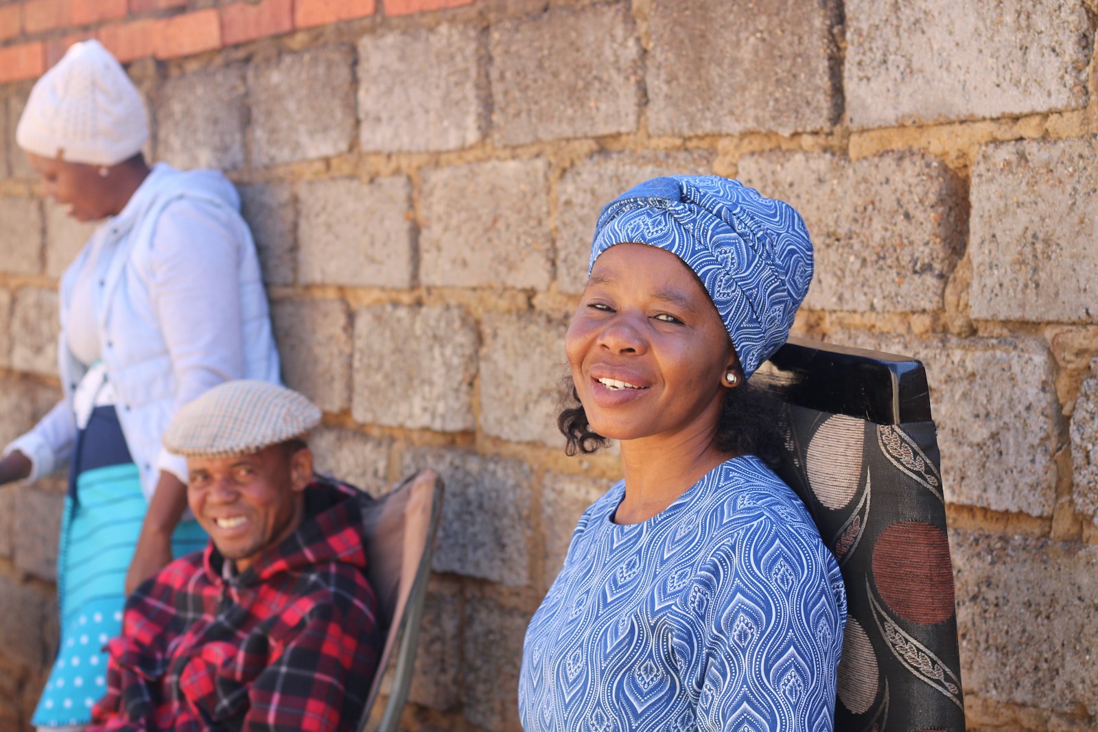 Community members smiling together outdoors